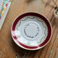 Coupelle ronde bord doré chinée en porcelaine - décor phrase mantra
