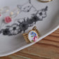 Bague nœud en Acier inoxydable doré - décorée à partir de vaisselle - Rose et petites fleurs bleues