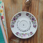 Coupelle ronde Fleurs de ton violet chinée en porcelaine - décor phrase mantra