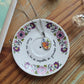 Coupelle ronde Fleurs de ton violet chinée en porcelaine - décor phrase mantra