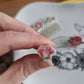 Pin's en Fer rhodié - décoré à partir de vaisselle - Forme fleur - Moyenne rose