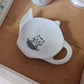 Repose sachet de thé en porcelaine - décor tête de chat peint à la main